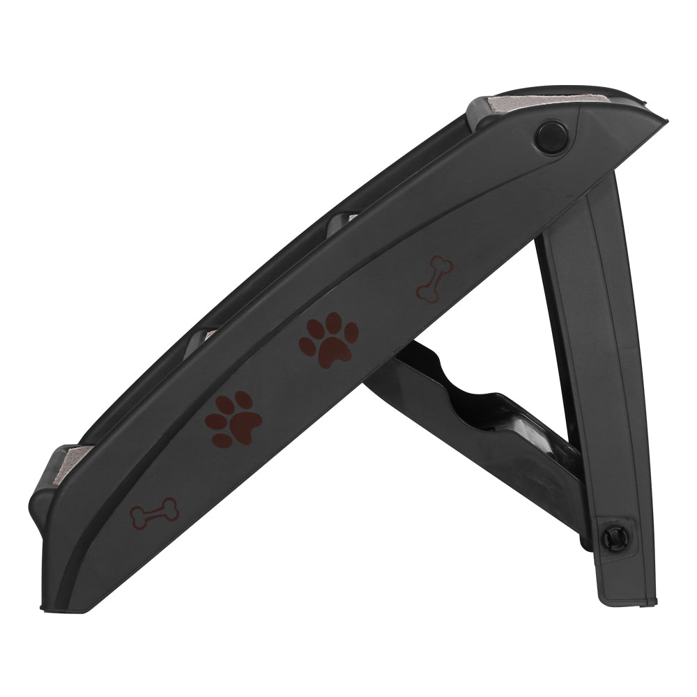 Folded black dog ramp on compact hinge frame with paw grip decals