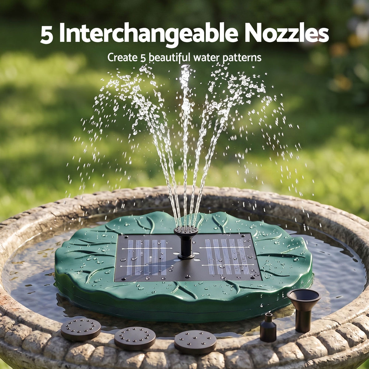 Green solar fountain pump with lotus-leaf top and multiple interchangeable nozzle pieces.