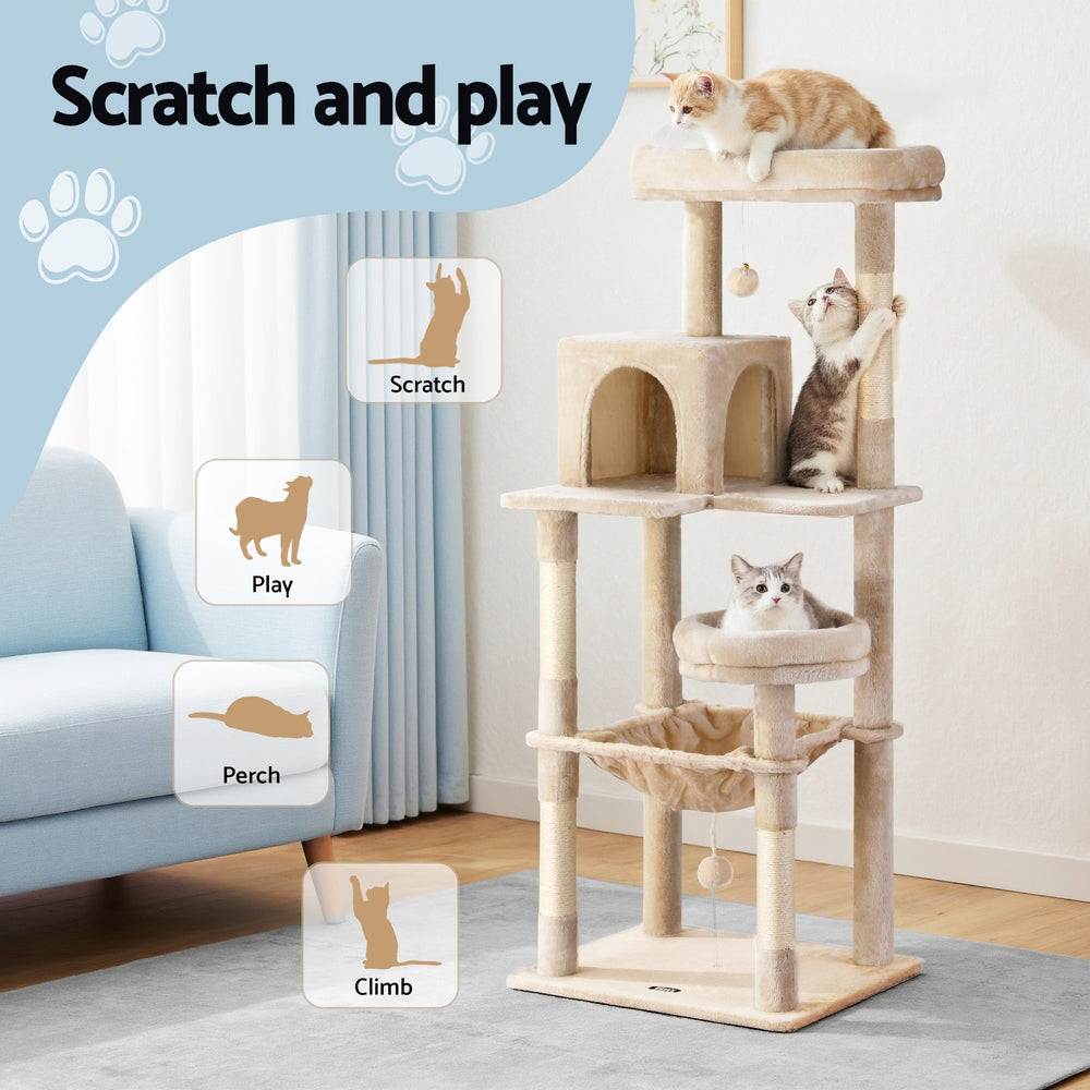 Beige cat tree with tunnel condo, cushioned hammock, and stacked platforms
