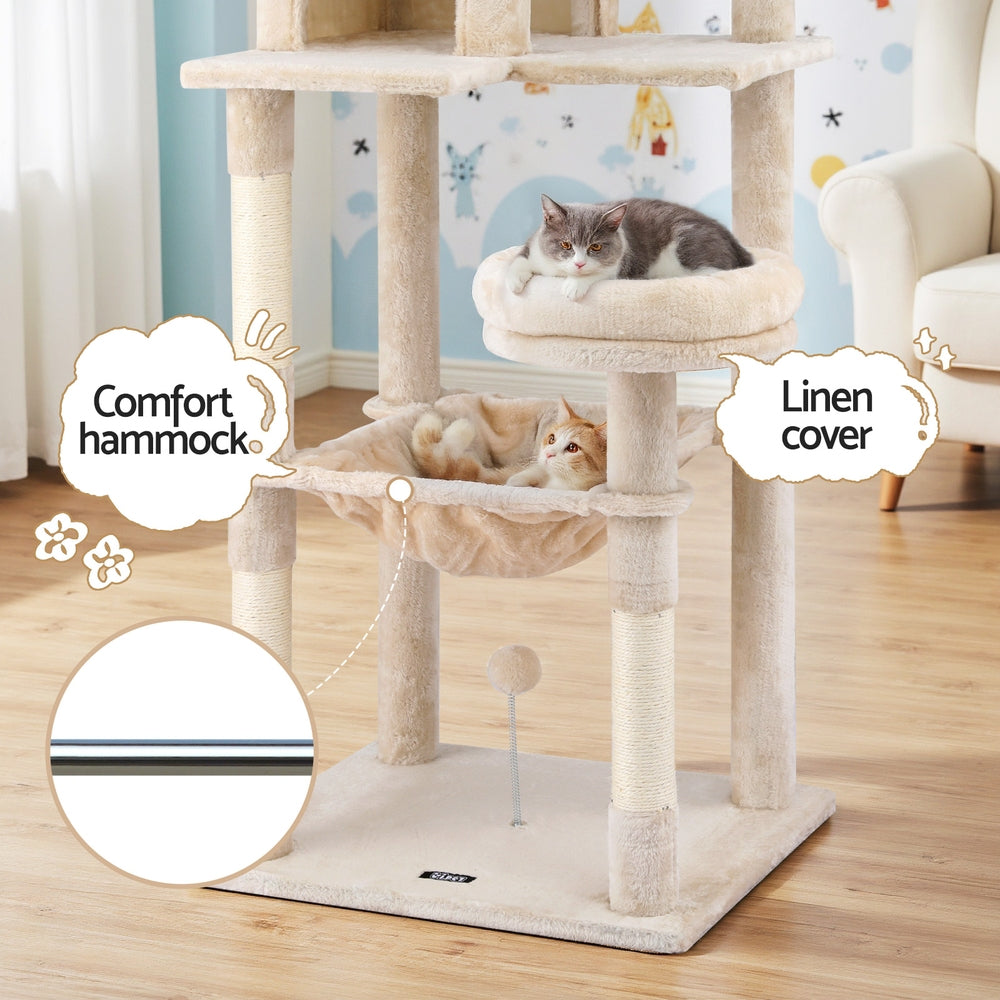 Beige cat tree hammock bed with plush cover on a multi-level scratching post base