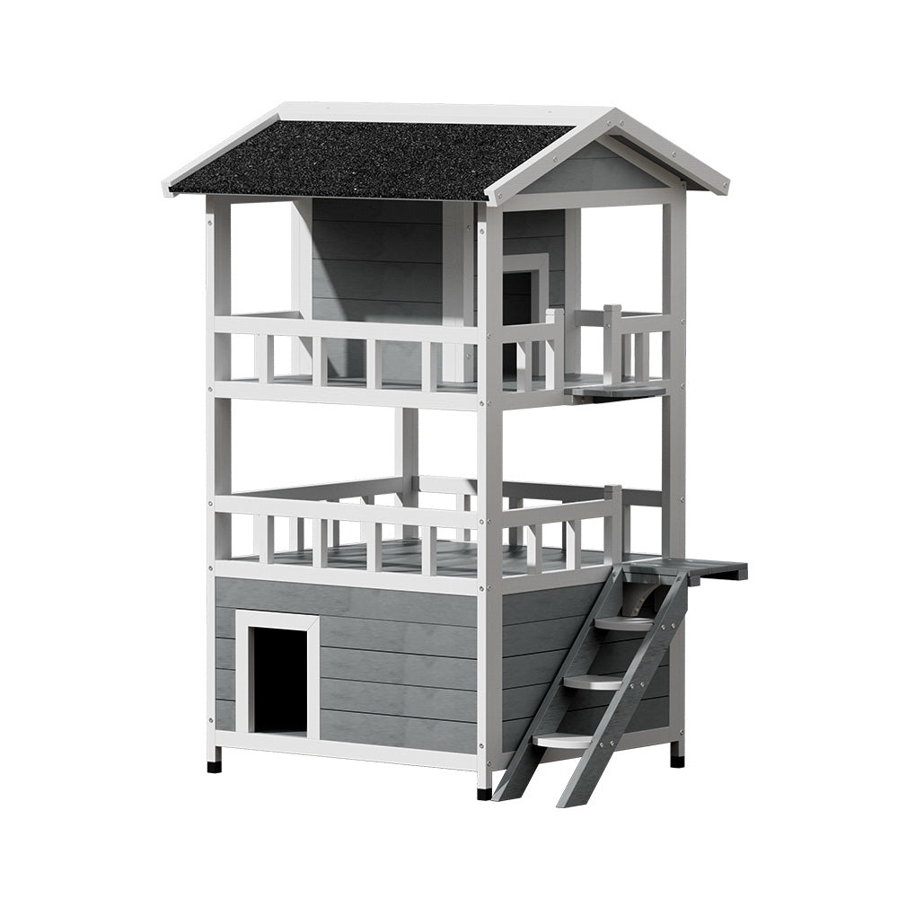 White wooden outdoor cat house with black shingle roof, two levels, and ramp