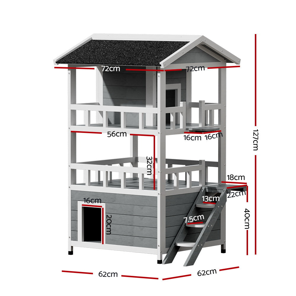 White wooden outdoor cat house with ramp stairs and enclosed door openings