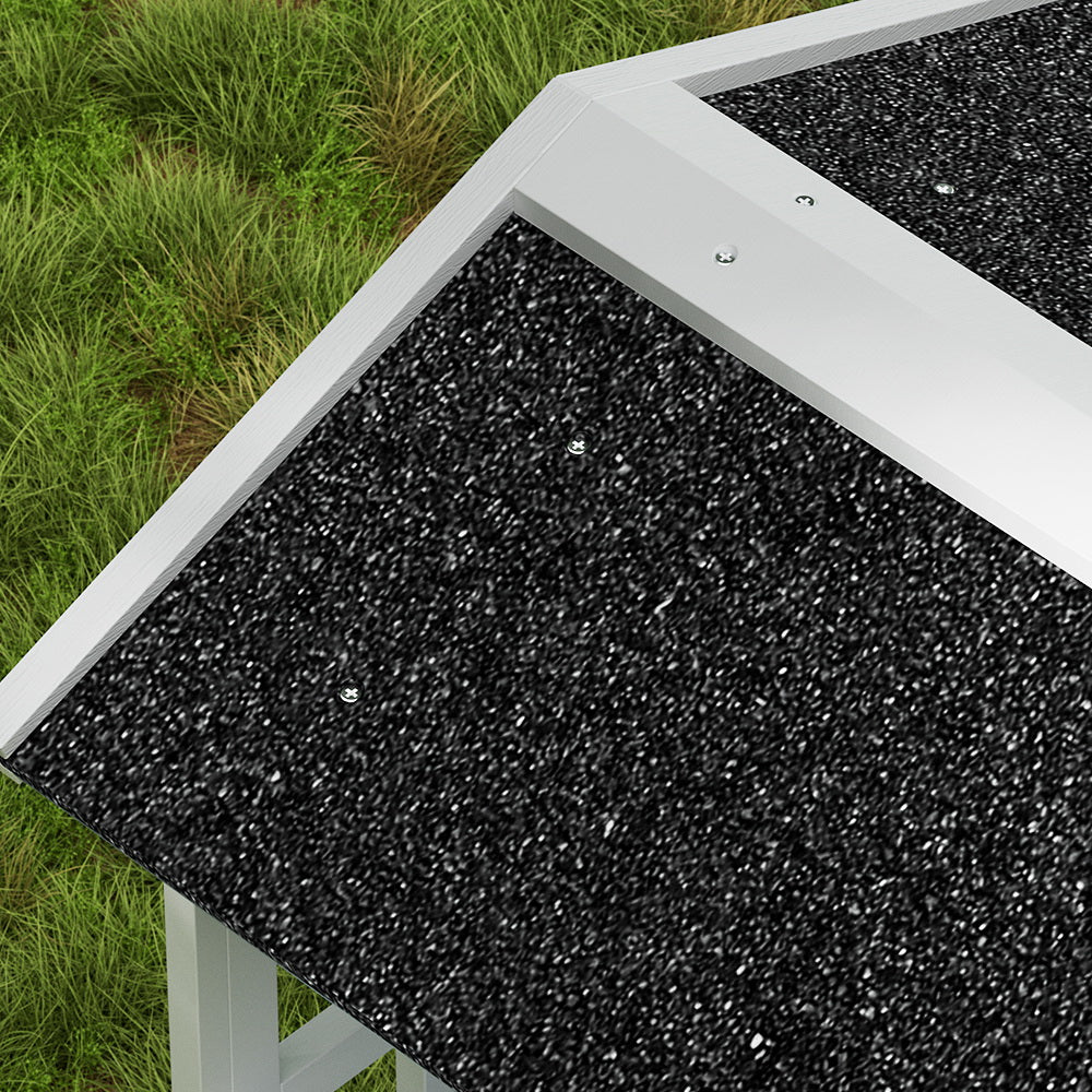 Black textured shingle roof with white frame on a wooden cat house