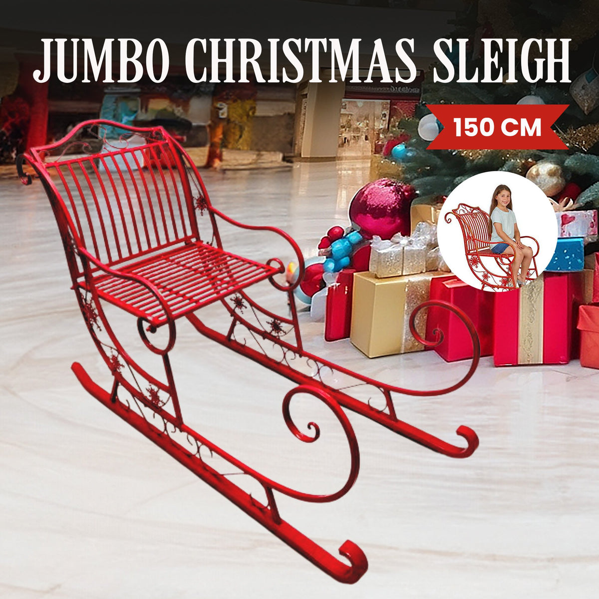 Red wrought-iron sleigh decoration with slatted seat and decorative curled runners.