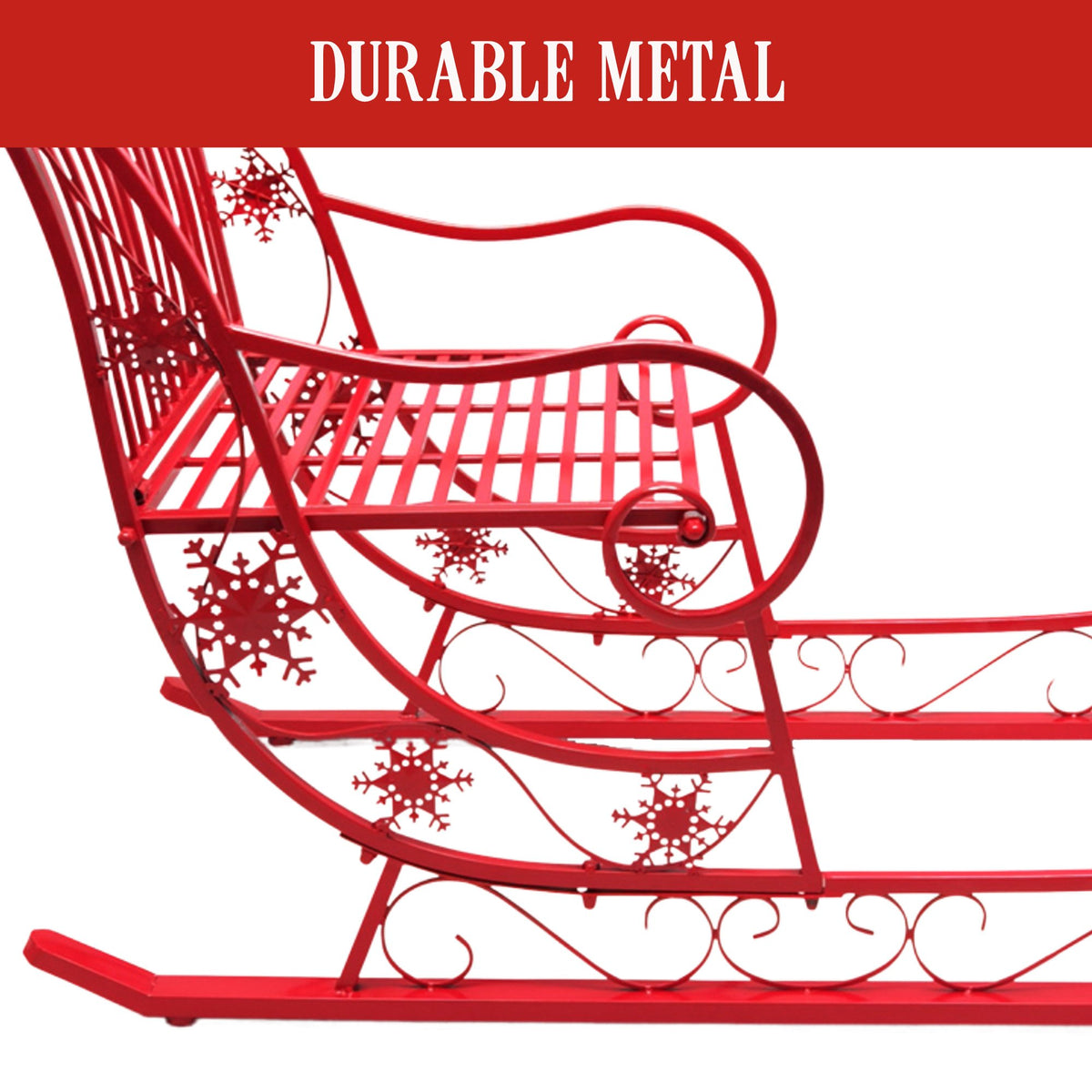 Red metal sleigh detail: lattice seat and snowflake cutout panels.