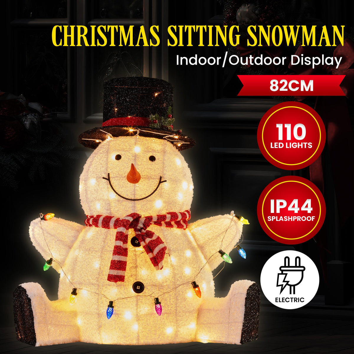 Sitting snowman with top hat, red scarf, and warm LED lights
