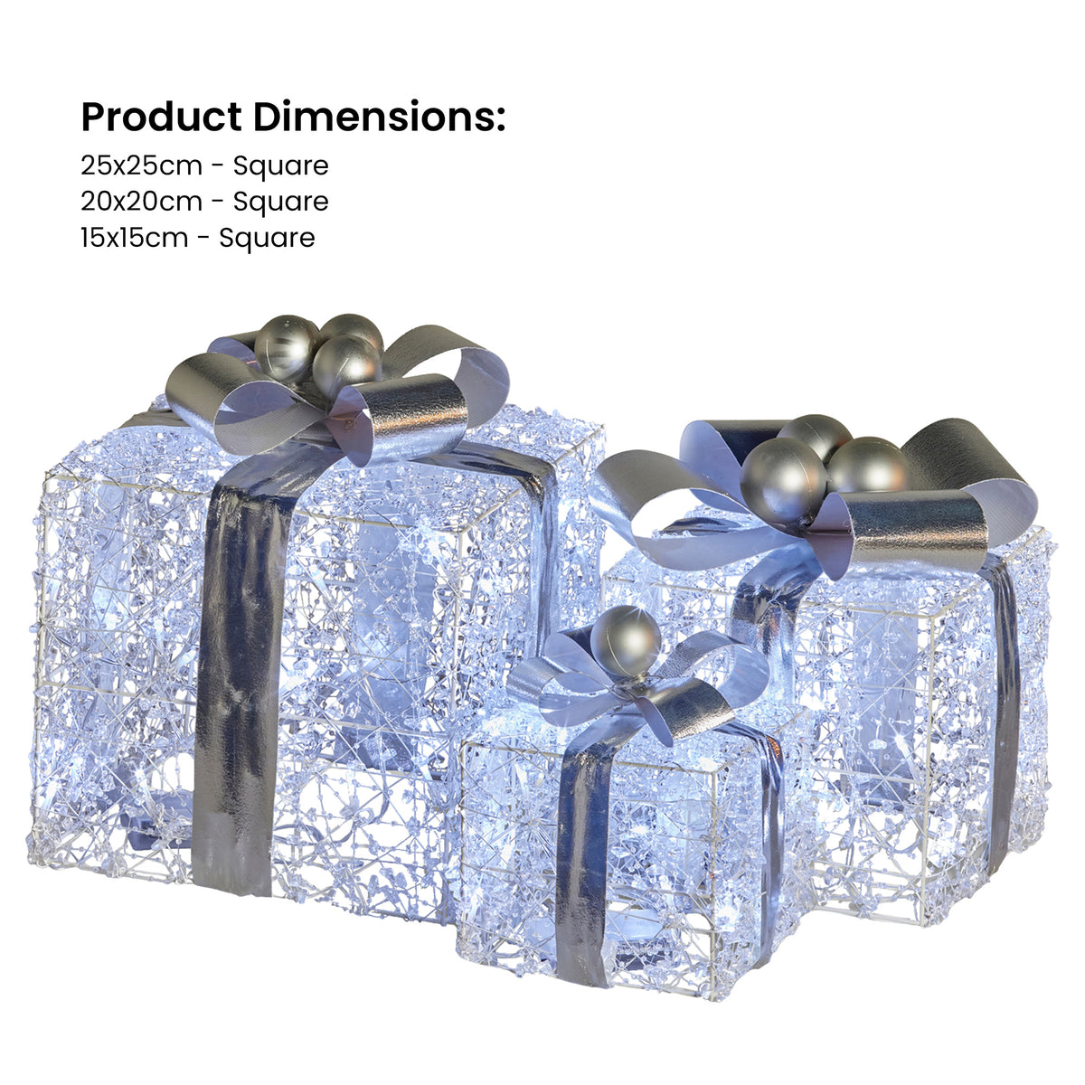 Three lit square gift boxes in silver foil with metallic ribbon bow details