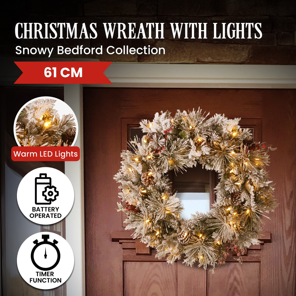 Snowy Christmas wreath with warm LED lights and frosted pine branches on a door.