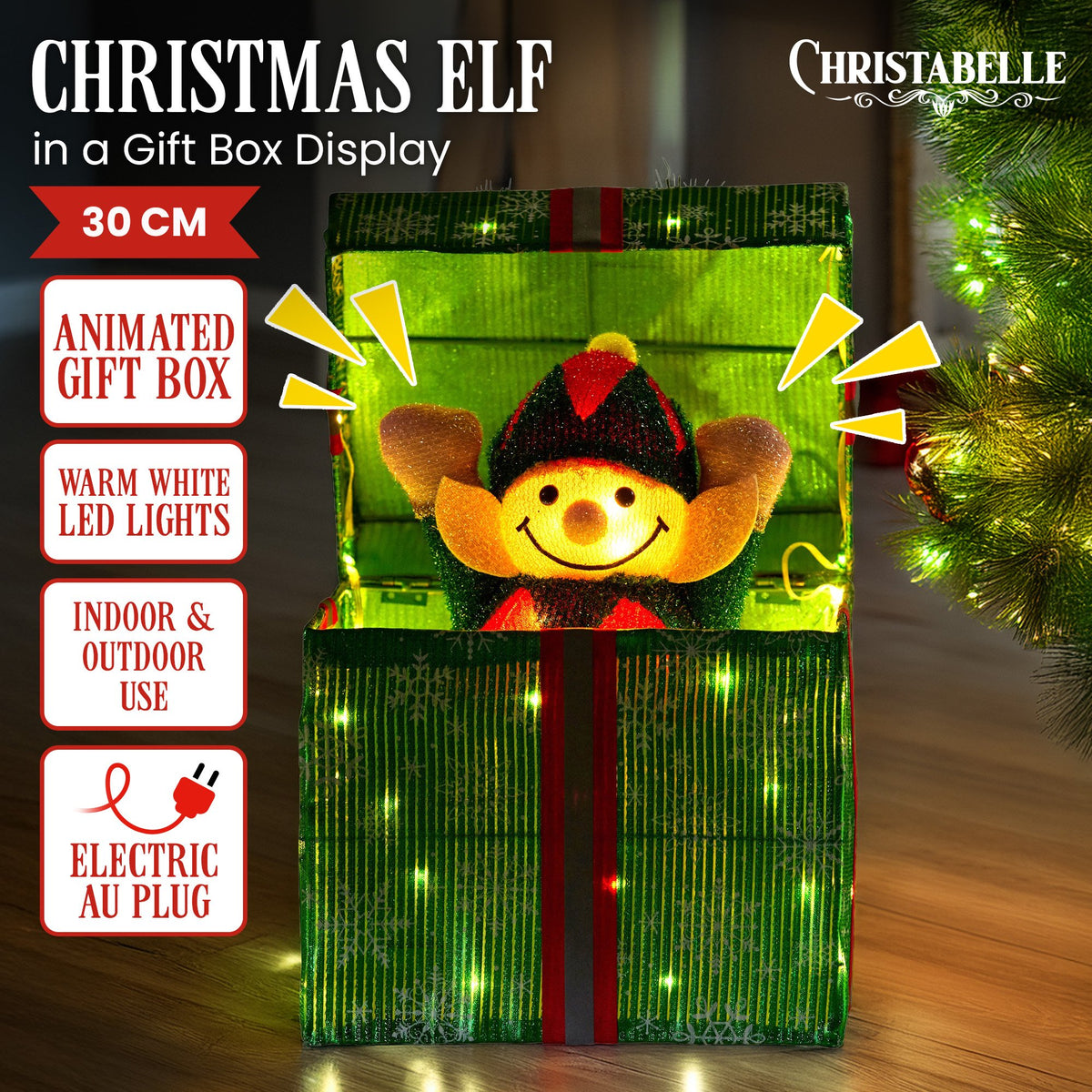 Green LED gift box with elf face, red-and-black hat and gold ears