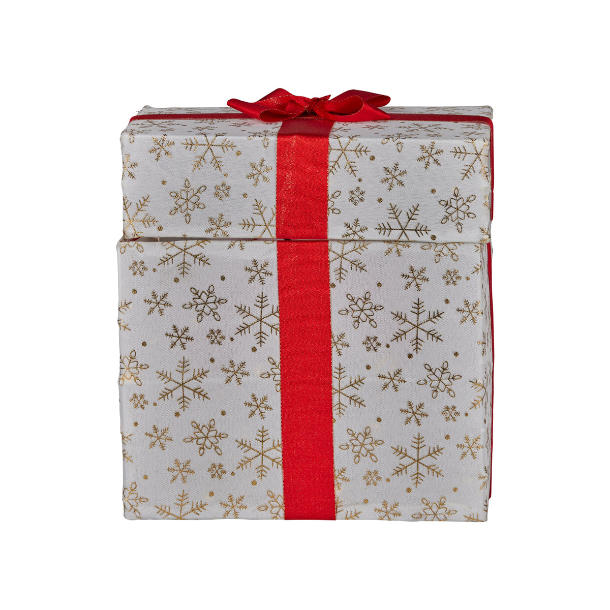 Snowflake gift box with red ribbon and bow, white wrap with gold snowflake patterns