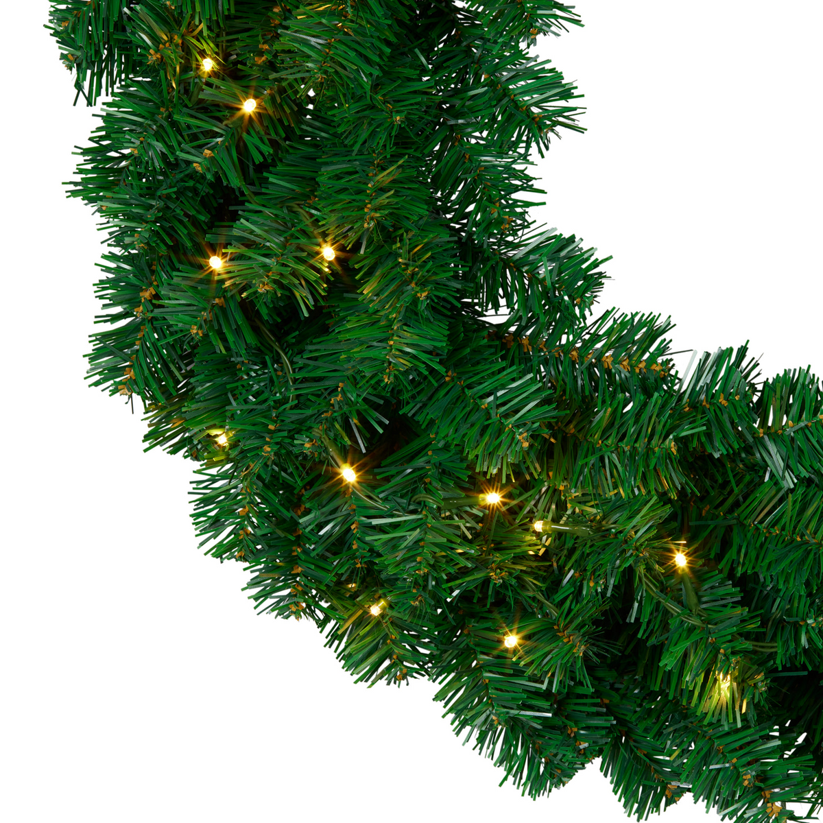 Close-up of green Christmas wreath foliage with warm white LED bulbs