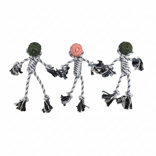 Three dog toys with rope and textured ends on a white background
