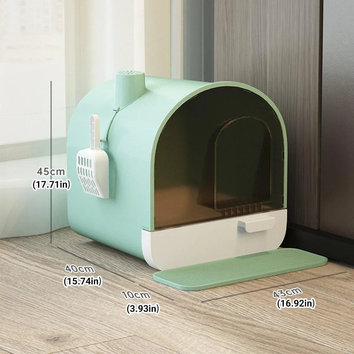 Mint green large enclosed cat litter pan with arched door, drawer, and entry mat