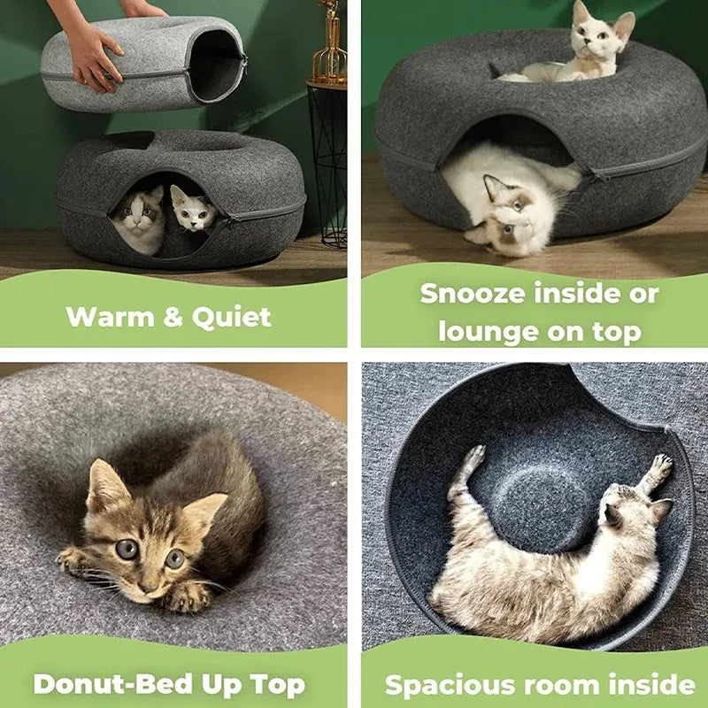 Dark grey felt donut tunnel cat bed with cats inside the cave and on the top