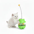 Cat tumbler toy with four different colored options, featuring a cat playing with it.