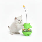 Cat tumbler toy with four different colored options, featuring a cat playing with it.