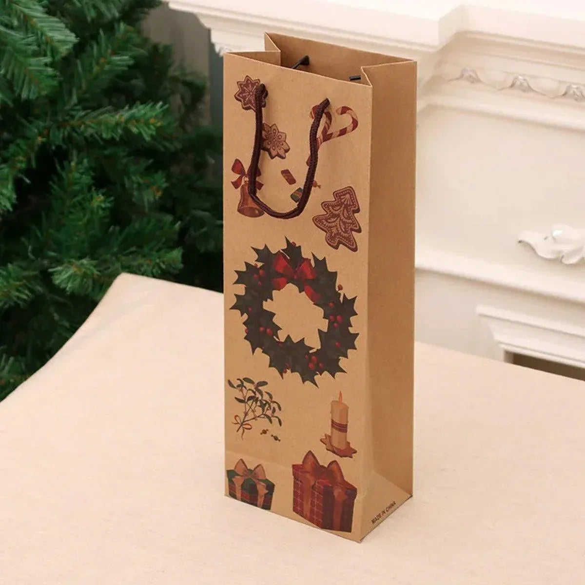 Kraft paper wine bottle gift bag with red holiday wreath and handle, single bag