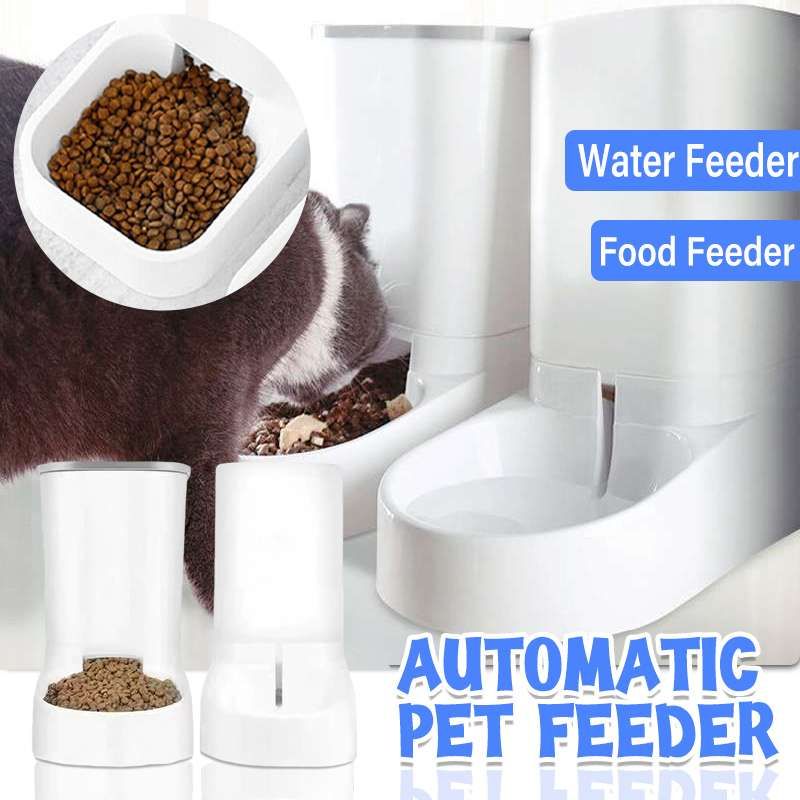 Automatic pet feeder with water and food compartments, showing a cat eating from it.