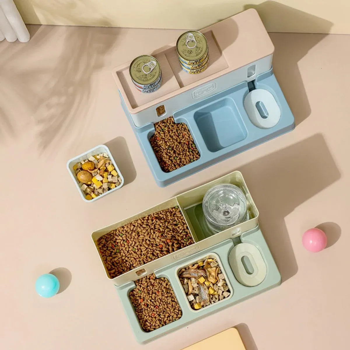 Blue automatic pet feeder with separated compartments for dry food and water