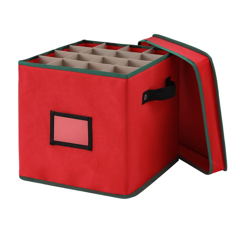 Red fabric Christmas ornament storage box with open top and divider compartments inside