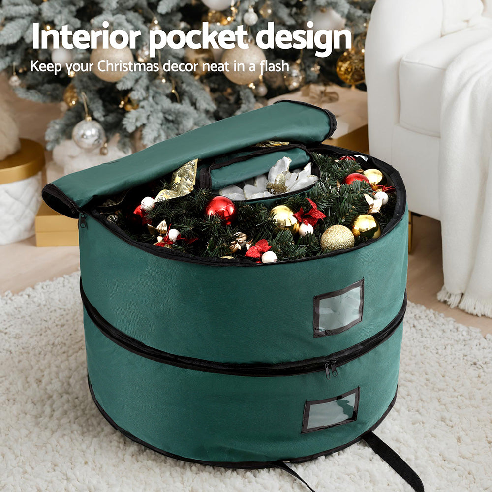 Teal round 2-tier bag with open top, interior pocket, and two front window panels