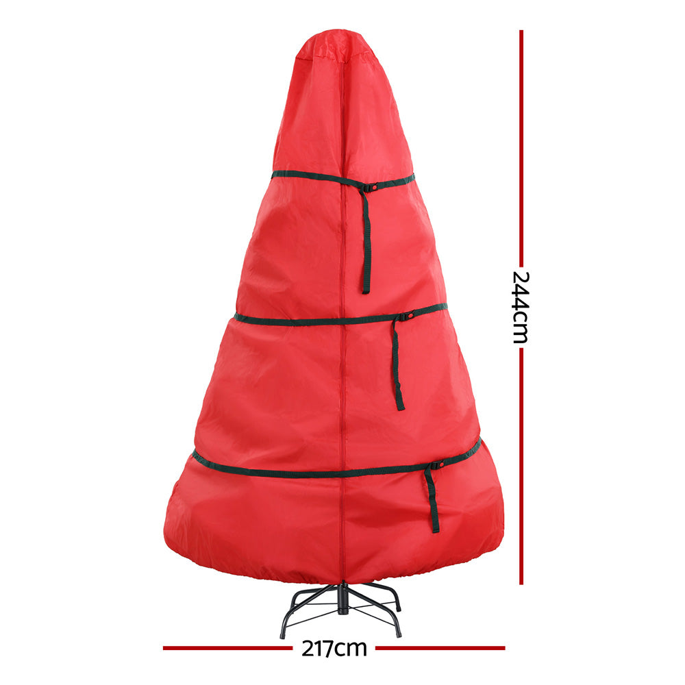 Red Christmas tree storage bag with green straps; 217cm wide, 244cm tall