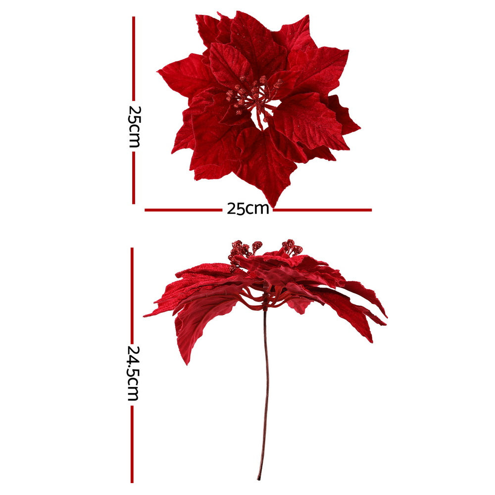 Set of two red poinsettia flower picks with curled leaves and glittery centers, on stems