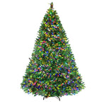 Artificial Christmas tree with dense branches and multicolor LED lights, full view