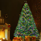 Artificial Christmas tree with multicolor LED lights, decorated topper and base