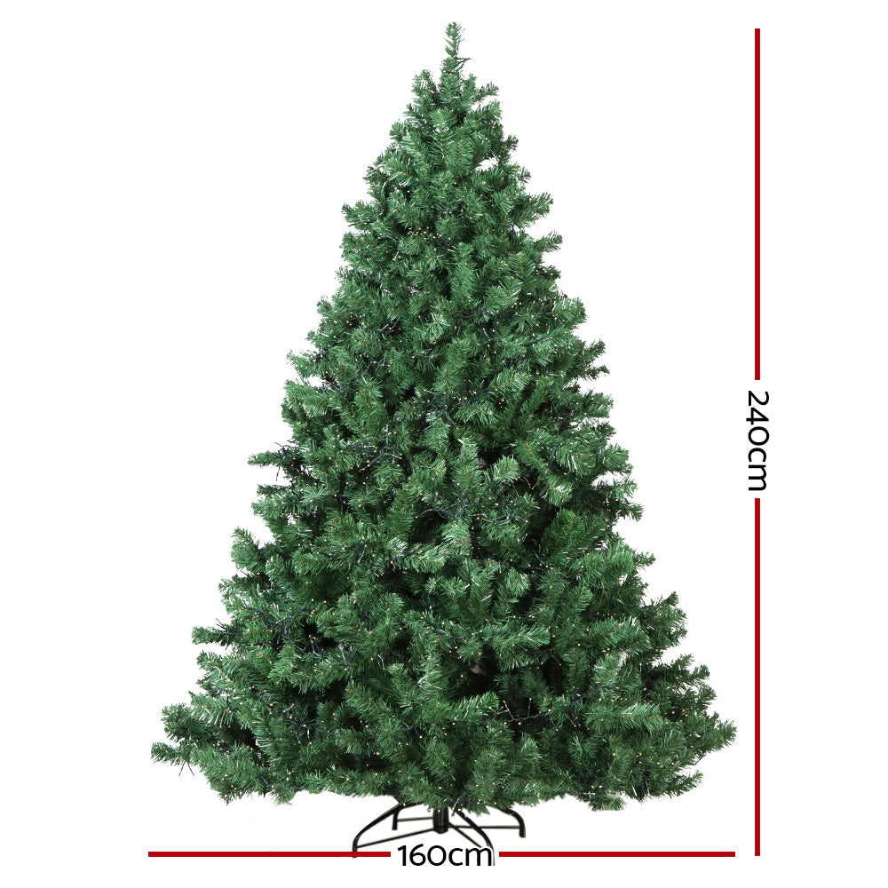 Artificial green Christmas tree with full triangular shape and stable base