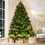 Artificial Christmas tree lit with warm yellow LED lights indoors