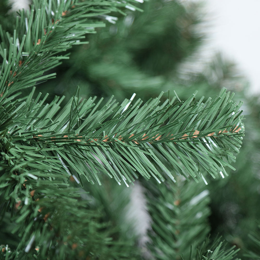 Close-up of green pine-foliage Christmas garland tips