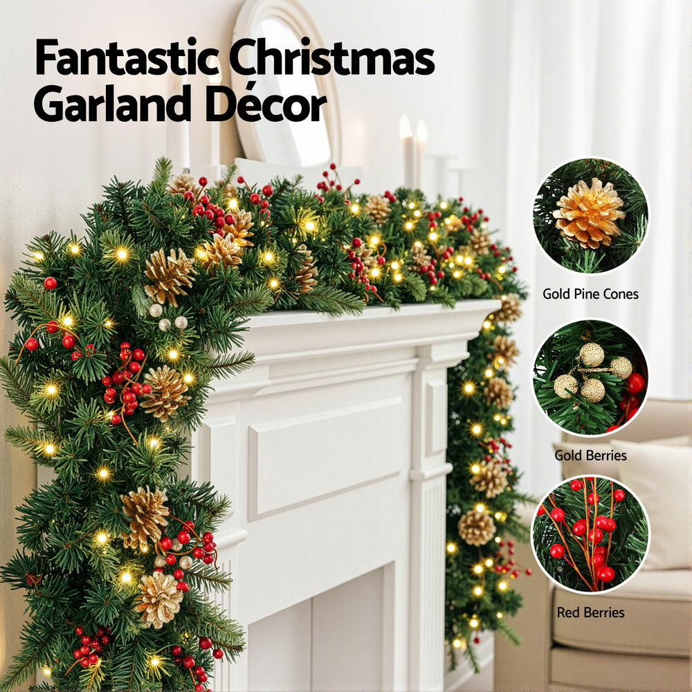 Pre-lit Christmas garland with pine greenery, gold pine cones, and red berries