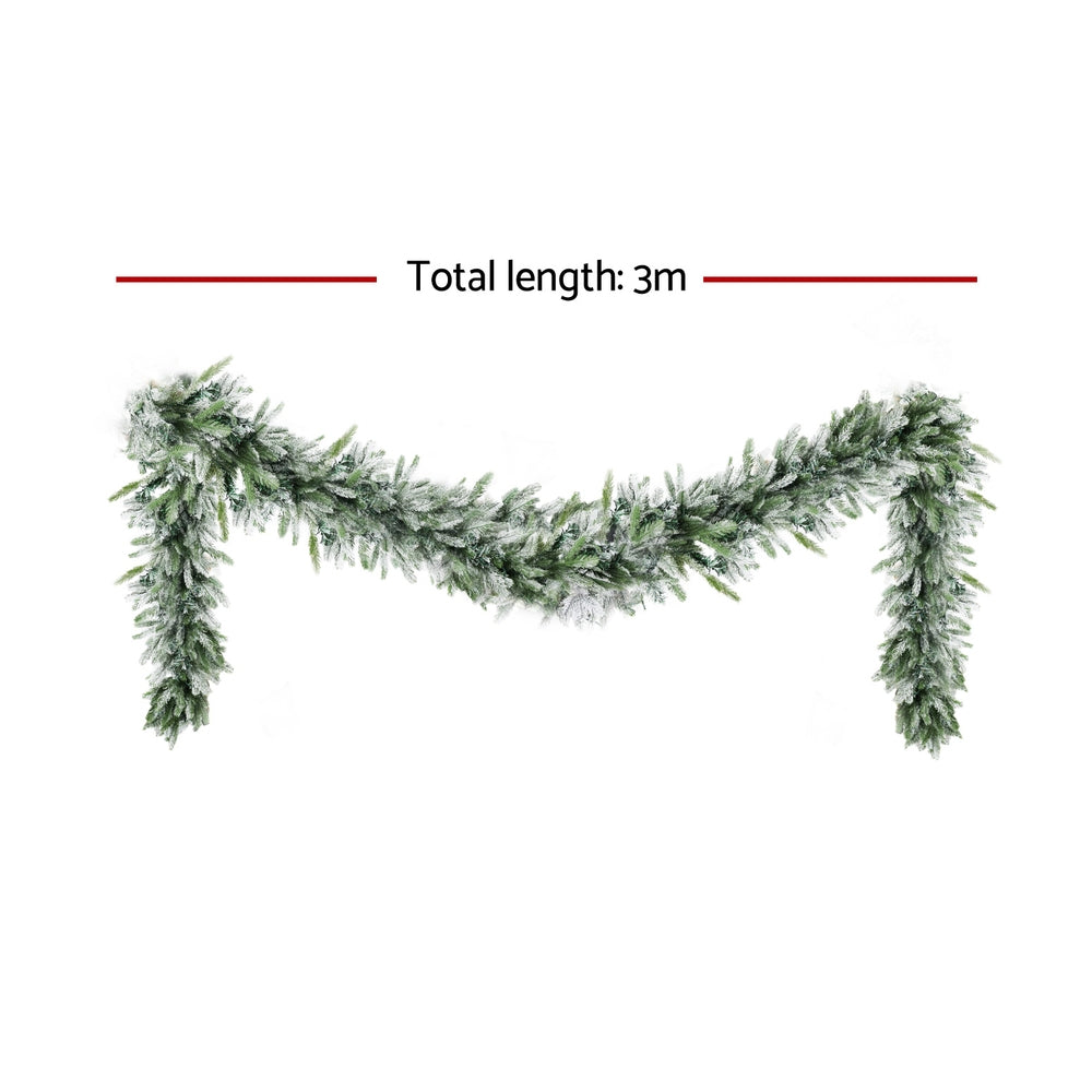 Frosted Christmas garland with dark green pine tips and warm LED lights (3 m)