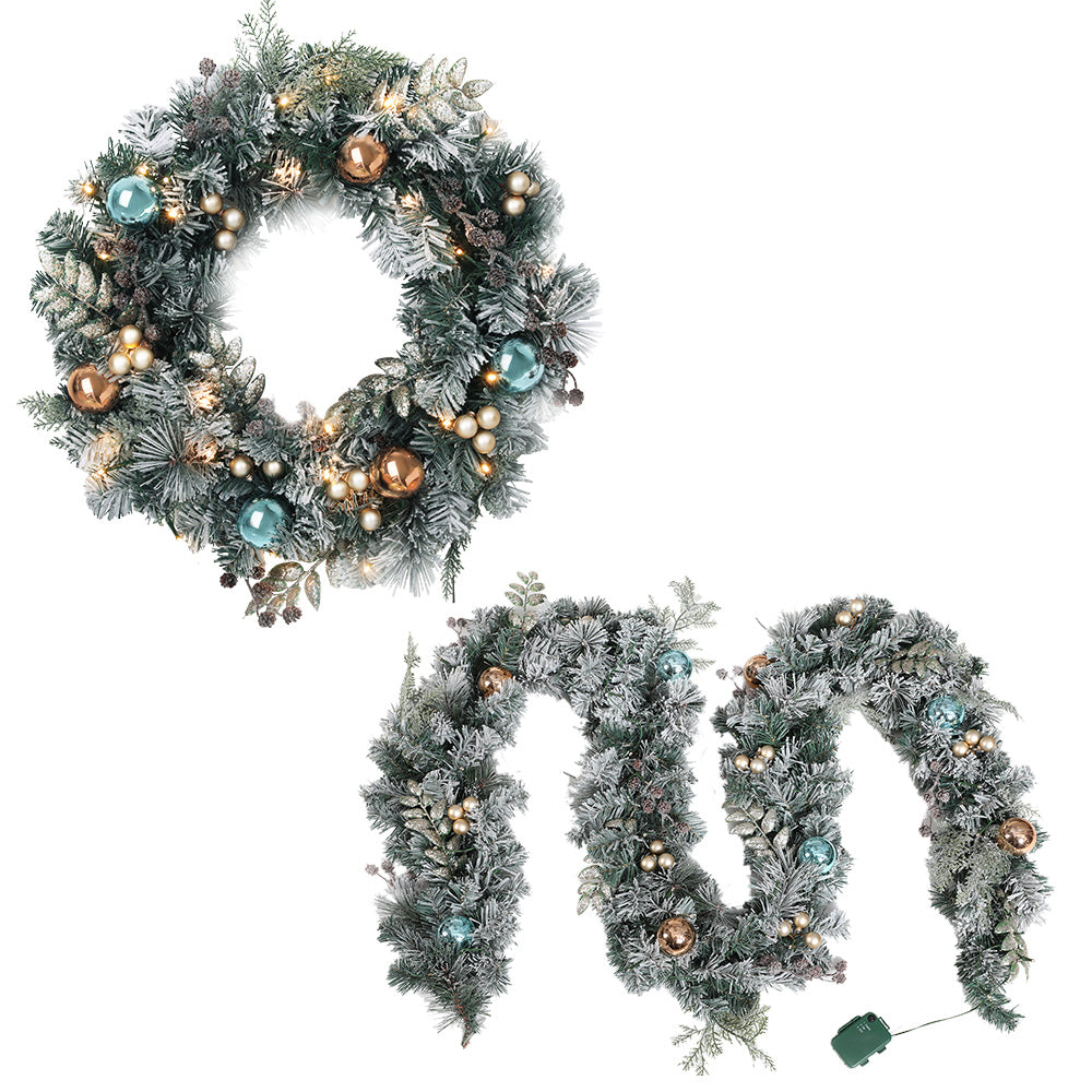 Green frosted wreath with LED lights and mixed gold, teal, and bronze bauble ornaments