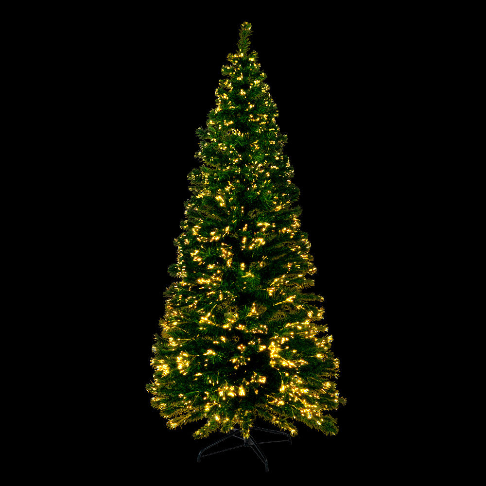 Slim artificial Christmas tree with warm white optic-fibre LED lights.