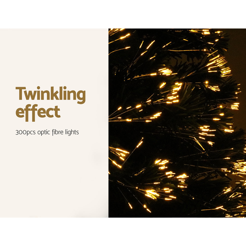 Optic-fibre LED branches with warm twinkling light effect on artificial tree.