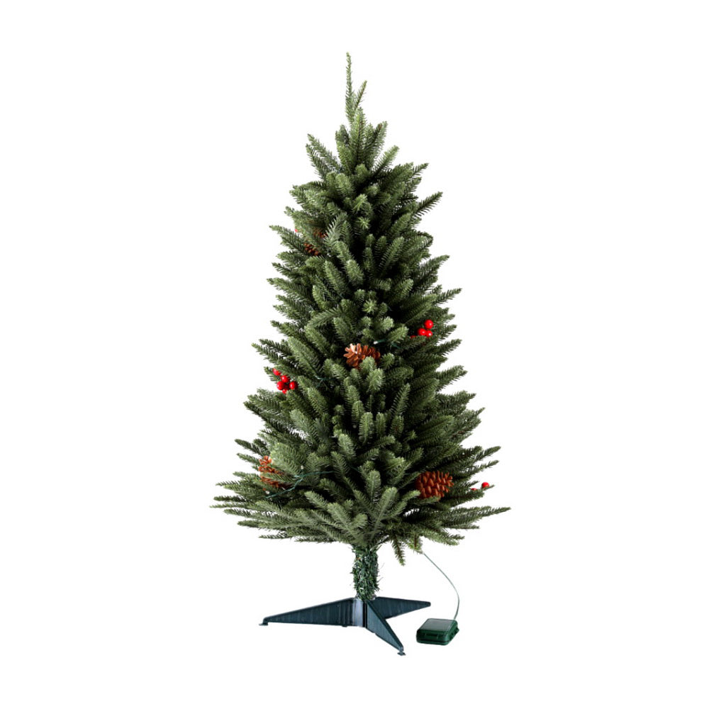 Mini artificial Christmas tree with warm white LED lights and red berry and pine cone accents