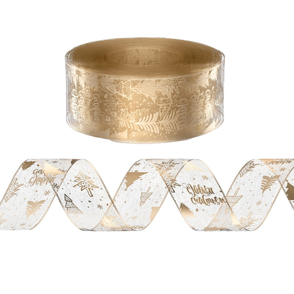 Gold printed Christmas ribbon roll with subtle tree, star, and snowflake motifs.