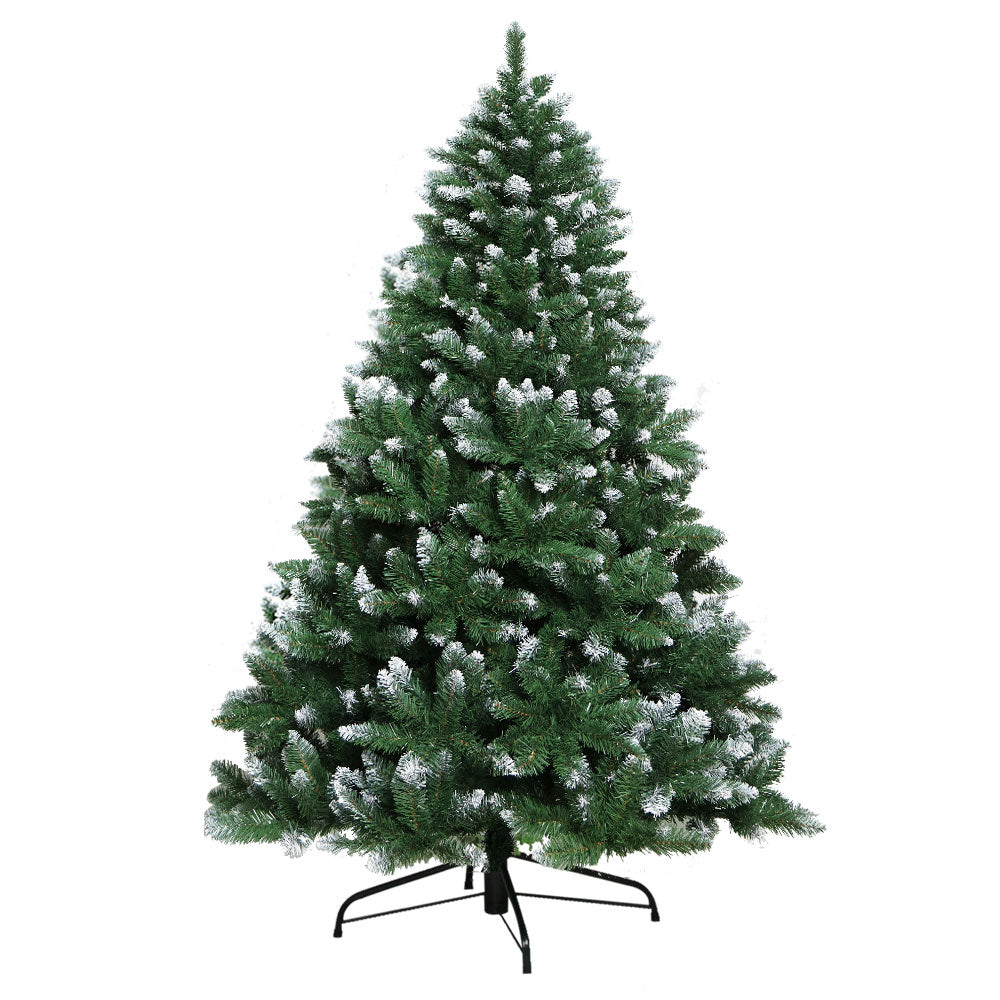 Artificial Christmas tree with snow-like decorations on a white background