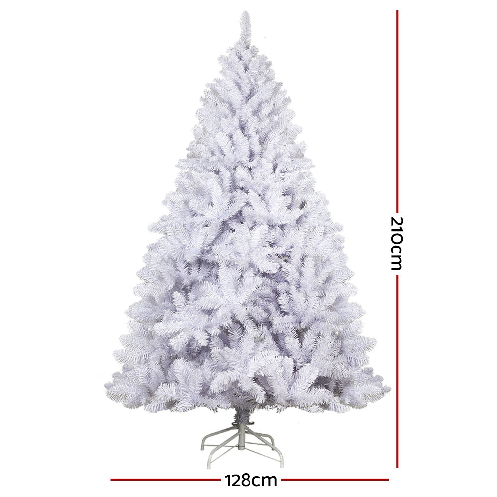 White-tipped artificial Christmas tree with metal stand, 128 cm height.