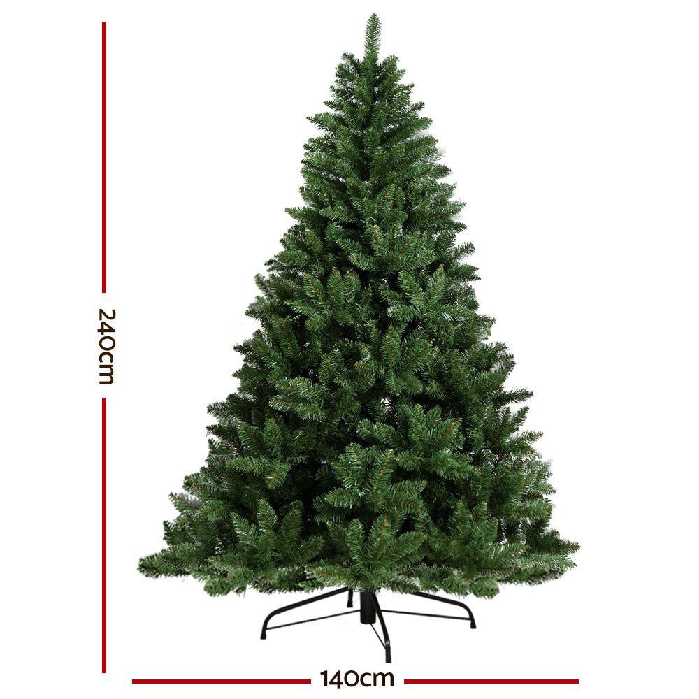 Green artificial Christmas tree with metal base stand, full height