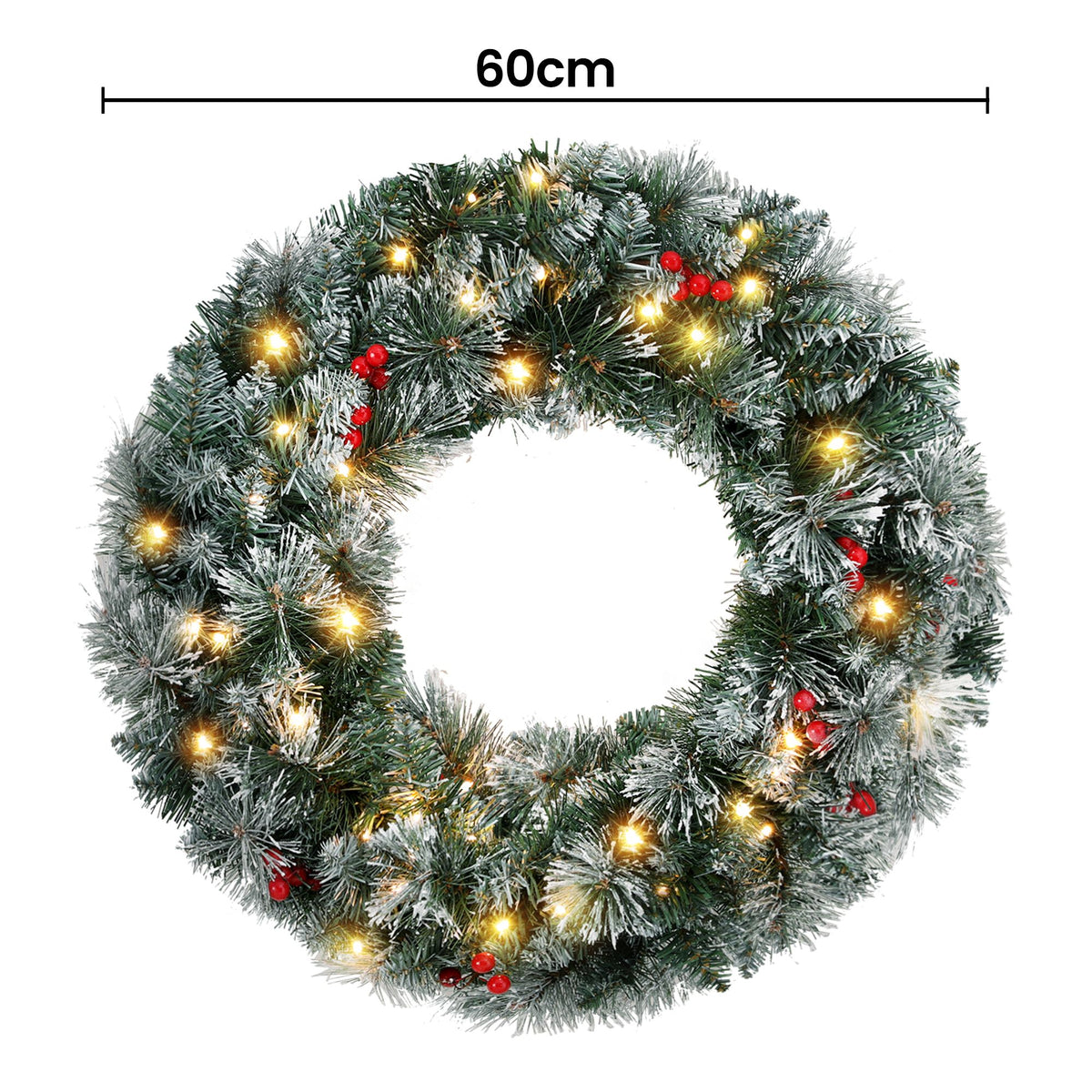 Flocked pine wreath with warm white LED lights and red berries in a circular design