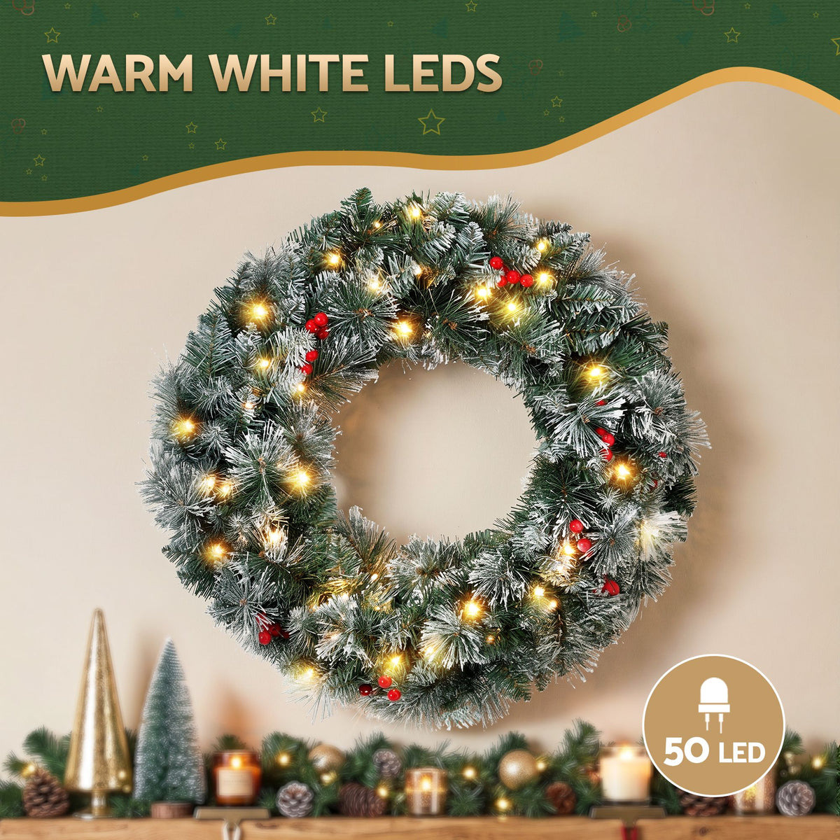 Flocked pine wreath with warm white LED lights and red berry accents, decorative ring