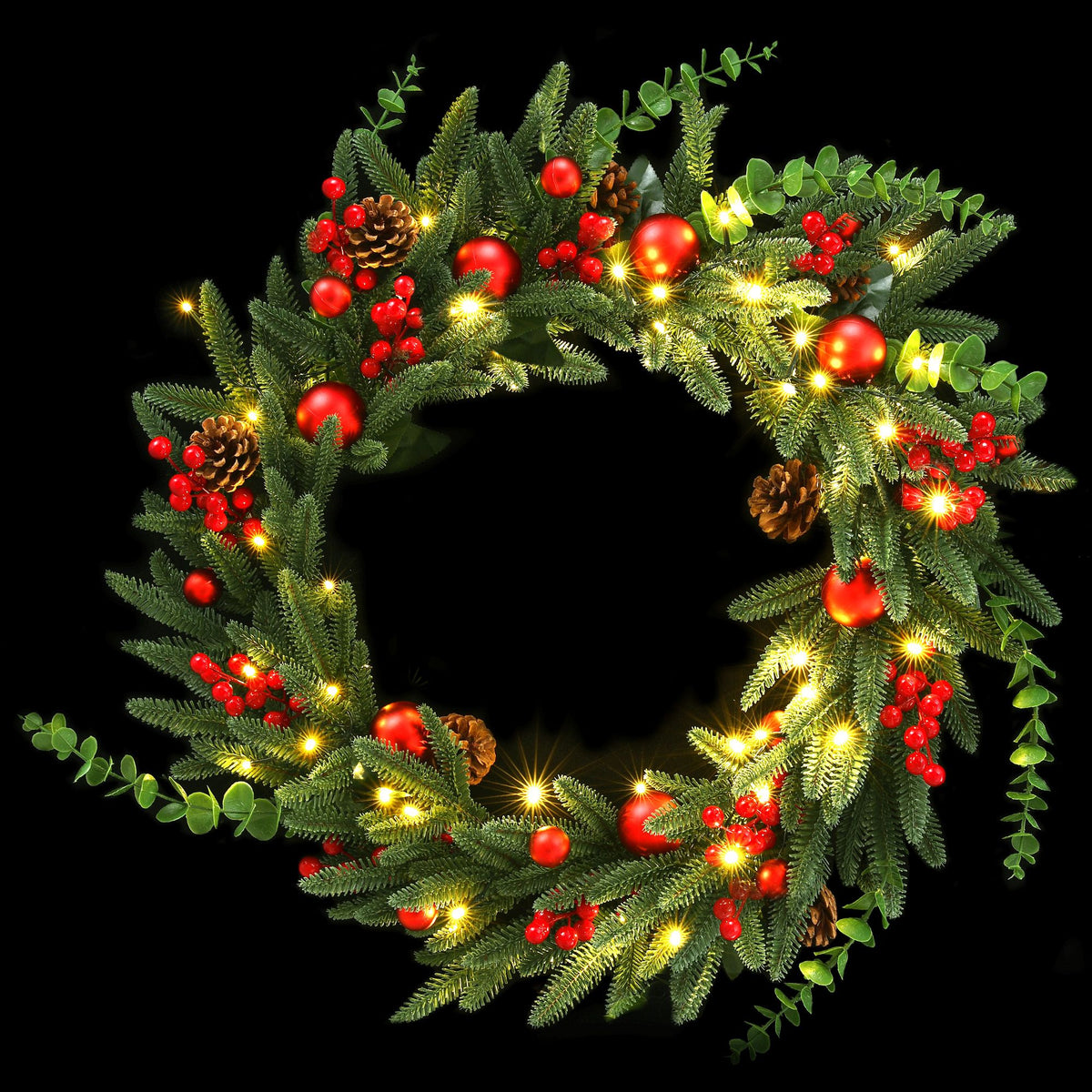 Pre-lit Christmas wreath with pine needles, red berries, pinecones, and warm LED lights