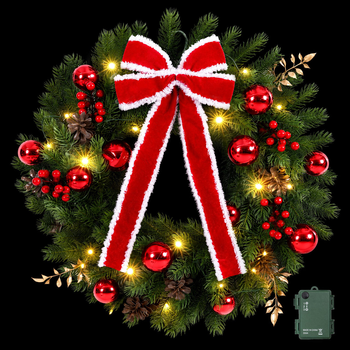 Pre-lit Christmas wreath with red ribbon bow, red baubles, pinecones, warm LED lights