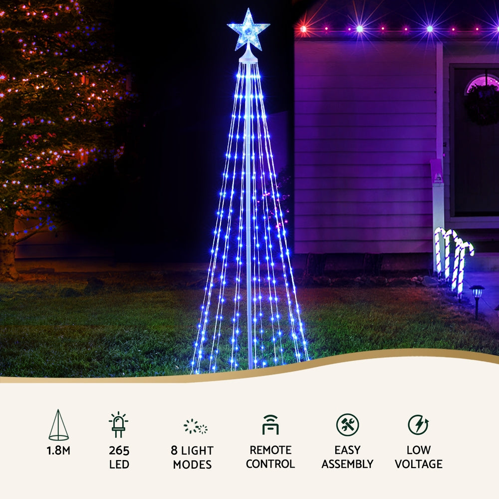 RGB LED Christmas tree with star topper, blue light strands for outdoor use.