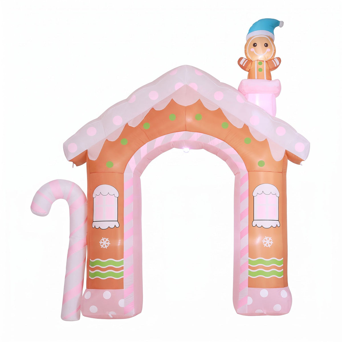 Inflatable pink gingerbread house decoration with candy-cane sides and glowing doorway lights