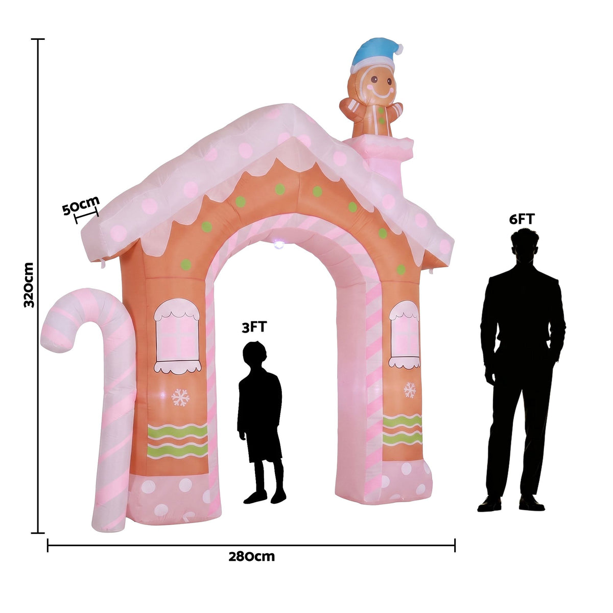 Inflatable gingerbread house yard decoration with lit arch doorway and nutcracker-style roof topper