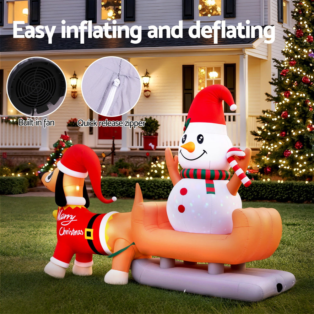 Inflatable dog and snowman decoration with LED lights and included inflating fan